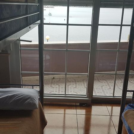 Albergue De Peregrinos Playa Quenxe Коркубион Экстерьер фото